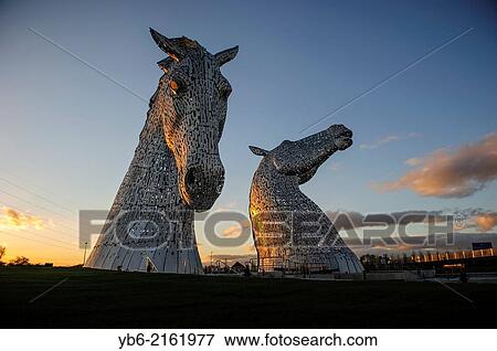 Stock Photo - The Kelpies sculpture by artist Andy Scott at The Helix Park, Falkirk, Scotland, UK.. Fotosearch