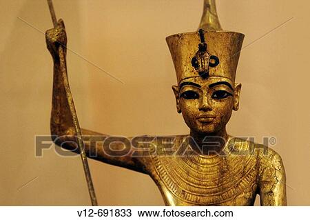The King as harpooner, golden statue of king Tutankhamon, New Kingdom, Egyptian museum, Cairo, Egypt View Large Photo Image Stock Image - The King as harpooner, golden statue of king Tutankhamon, New Kingdom, Egyptian museum, Cairo, Egypt. Fotosearch