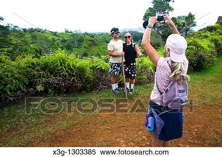 Stock Photography - The Kuilau and Moalepe trail begin near Wailua's Keahua Arboretum and travels up to views of Mt. Waialeale and the ocean, Kauai, Hawaii, USA. Fotosearch