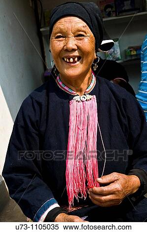The Lanten Yao women pluck out their eyebrow hair. They live in south Yunnan province in China and in North Laos. View Large Photo Image Stock Photography - The Lanten Yao women pluck out their eyebrow hair. They live in south Yunnan province in China and in North Laos.. Fotosearch