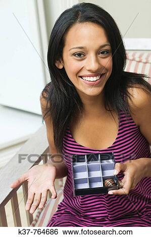 The last chocolate in the box View Large Photo Image Stock Photograph - The last chocolate in the box. Fotosearch