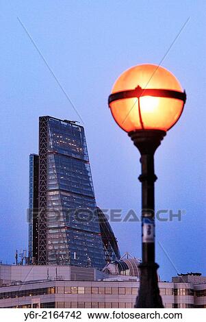 The Leadenhall Building, popularly known as The Cheesegrater, still under construction, in the heart of the City of London international business district, seen from across the River Thames at dusk. View Large Photo Image Stock Image - The Leadenhall Building, popularly known as The Cheesegrater, still under construction, in the heart of the City of London international business district, seen from across the River Thames at dusk.. Fotosearch