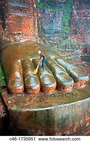 The Leshan Giant Buddha, which at 71 m or 233 ft is the largest stone Buddha in the world, Leshan, Sichuan Province, Dadu river a tributary of the Yangtze River, China. View Large Photo Image Stock Image - The Leshan Giant Buddha, which at 71 m or 233 ft is the largest stone Buddha in the world, Leshan, Sichuan Province, Dadu river a tributary of the Yangtze River, China.. Fotosearch