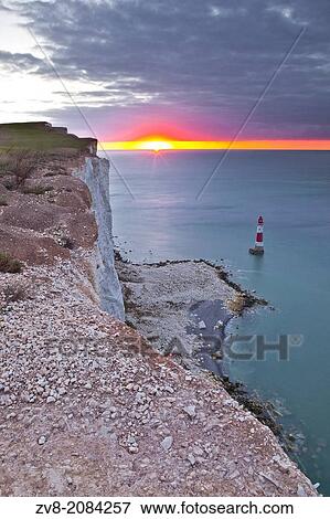Stock Photo - The lighthouse at Beachy Head in East Sussex.. Fotosearch