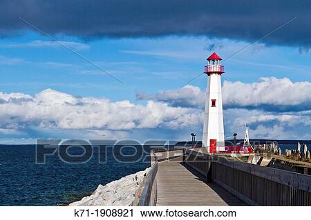 Stock Image - The lighthouse in the bay at St Ignace Michigan Upper Penninsula, USA. Fotosearch
