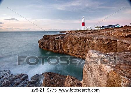The lighthouse on Portland Bill, Isle of Portland. The isle forms part of the Jurassic coast protected by UNESCO. View Large Photo Image Stock Photography - The lighthouse on Portland Bill, Isle of Portland. The isle forms part of the Jurassic coast protected by UNESCO.. Fotosearch