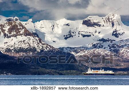 Stock Photo - The Lindblad Expedition Ship National Geographic Explorer operating in Seno Agostini Fjord, Straits of Magellan, Patagonia, Chile. Fotosearch
