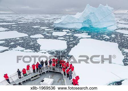 The Lindblad Expedition ship National Geographic Explorer on expedition in Crystal Sound, below the Antarctic Circle, Antarctica, Southern Ocean. View Large Photo Image Stock Photograph - The Lindblad Expedition ship National Geographic Explorer on expedition in Crystal Sound, below the Antarctic Circle, Antarctica, Southern Ocean.. Fotosearch
