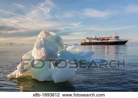The Lindblad Expeditions ship National Geographic Explorer amongst grounded icebergs in Vikingbukta Viking Bay, Scoresbysund, Northeast Greenland View Large Photo Image Stock Image - The Lindblad Expeditions ship National Geographic Explorer amongst grounded icebergs in Vikingbukta Viking Bay, Scoresbysund, Northeast Greenland. Fotosearch