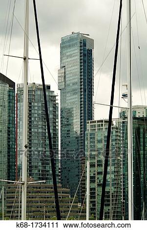 The Living Shangri La towers over downtown Vancouver in this view from Stanley Park View Large Photo Image Stock Image - The Living Shangri La towers over downtown Vancouver in this view from Stanley Park. Fotosearch