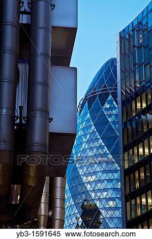 Stock Photography - The Lloyds Building and The Swiss Re building The Gherkin, London, England. Fotosearch