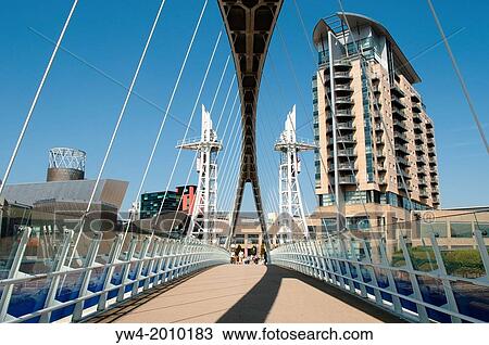 The Lowry footbridge, Salford Quays, Greater Manchester, UK. View Large Photo Image Stock Image - The Lowry footbridge, Salford Quays, Greater Manchester, UK.. Fotosearch