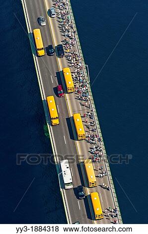 Stock Photo - The Mackinac Bridge Walk is an annual event held every Labor Day since 1958 in Michigan in which people may walk the length of the Mackinac Bridge. Fotosearch