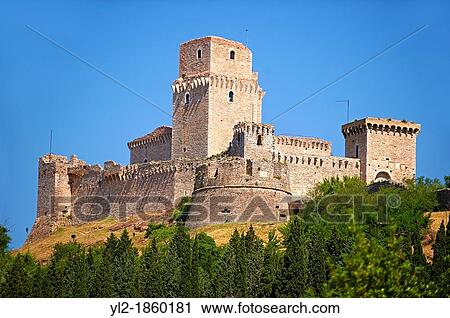 The medieval battlements of the Rocca Maggiore castle on the hilltop above Assisi, Italy View Large Photo Image Stock Image - The medieval battlements of the Rocca Maggiore castle on the hilltop above Assisi, Italy. Fotosearch