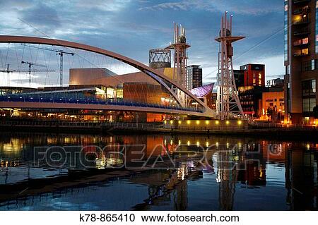 The millenium Bridge and Lowry at Salford Quays, Manchester, England, UK View Large Photo Image Stock Image - The millenium Bridge and Lowry at Salford Quays, Manchester, England, UK. Fotosearch