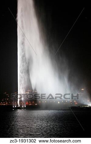 The monumental water fountain Jet d? Eau at the Lake Geneva, Canton of Gen? ve, Switzerland. View Large Photo Image Stock Image - The monumental water fountain Jet d? Eau at the Lake Geneva, Canton of Gen? ve, Switzerland.. Fotosearch