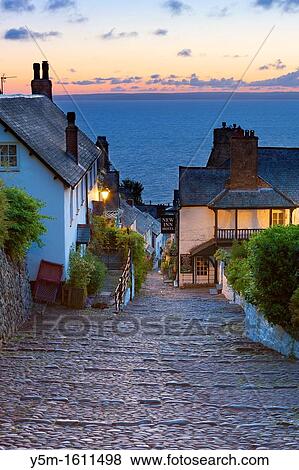 The narrow cobbled streets of Clovelly, North Devon, England, UK, Europe View Large Photo Image Stock Photo - The narrow cobbled streets of Clovelly, North Devon, England, UK, Europe. Fotosearch