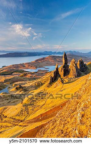 Stock Image - The Old Man of Storr, overlooking Loch Leathan and Sound of Raasay, Isle of Skye, Inner Hebrides, Scotland, UK, Europe.. Fotosearch