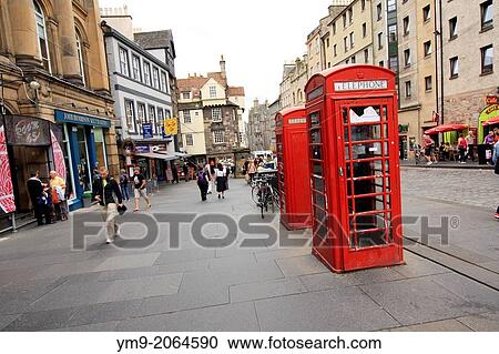 The Old town with historic architecture, traditional red phone boxes and tourists in Edinburgh, Scotland, United Kingdom, Europe. View Large Photo Image Stock Image - The Old town with historic architecture, traditional red phone boxes and tourists in Edinburgh, Scotland, United Kingdom, Europe.. Fotosearch