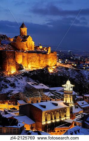 The old town with the mosque, the Narikala fortress and St Nicholas church in a winter evening. Georgia, Caucasus, Tbilisi. View Large Photo Image Stock Photo - The old town with the mosque, the Narikala fortress and St Nicholas church in a winter evening. Georgia, Caucasus, Tbilisi.. Fotosearch