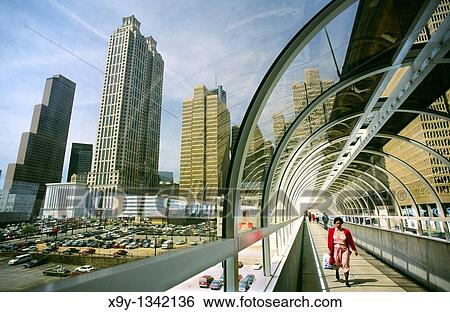 The Peachtree Center, Atlanta, Georgia, USA Elevated pedestrian walkway tunnel and downtown buildings View Large Photo Image Stock Photograph - The Peachtree Center, Atlanta, Georgia, USA Elevated pedestrian walkway tunnel and downtown buildings. Fotosearch