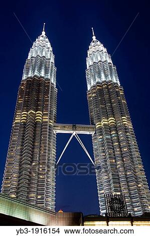 The Petronas Towers at Night, Kuala Lumpur, Malaysia View Large Photo Image Picture - The Petronas Towers at Night, Kuala Lumpur, Malaysia. Fotosearch