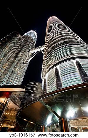 The Petronas Towers at Night, Kuala Lumpur, Malaysia View Large Photo Image Stock Photo - The Petronas Towers at Night, Kuala Lumpur, Malaysia. Fotosearch