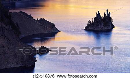 The Phantom Ship in Crater Lake, Oregon, at sunrise View Large Photo Image Stock Photograph - The Phantom Ship in Crater Lake, Oregon, at sunrise. Fotosearch