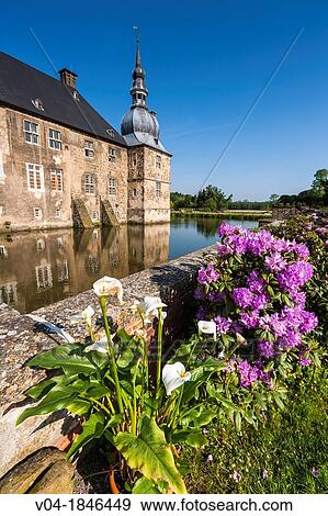 The picturesque moated castle of Lembeck, North Rhine-Westphalia, Germany, Europe View Large Photo Image Stock Photo - The picturesque moated castle of Lembeck, North Rhine-Westphalia, Germany, Europe. Fotosearch