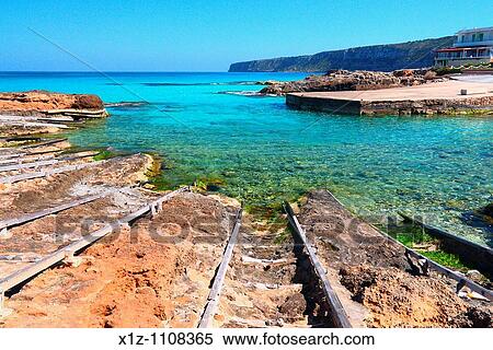 The pier of Es Cal? of San Agust? n in the island of Formentera Baleares, Spain View Large Photo Image Stock Photography - The pier of Es Cal? of San Agust? n in the island of Formentera Baleares, Spain. Fotosearch