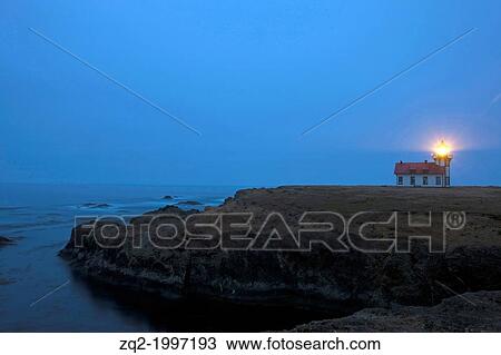 The Point Cabrillo lighthouse stands as a beacon at dusk along Mendocino cliffs near Mendocino, California, USA. View Large Photo Image Stock Image - The Point Cabrillo lighthouse stands as a beacon at dusk along Mendocino cliffs near Mendocino, California, USA.. Fotosearch