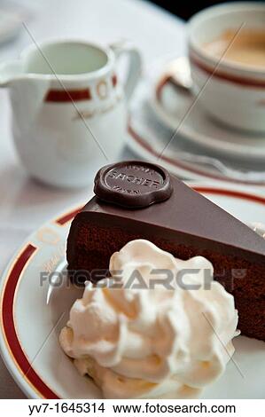 The presentation of the original Sacher-Torte A portion with a scoop of cream Vienna, Austria View Large Photo Image Picture - The presentation of the original Sacher-Torte A portion with a scoop of cream Vienna, Austria. Fotosearch