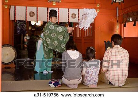 The priest during a ceremony Ancient shinto shrine of Hirakiki City of Ibusuki Island of Kyushu Japan View Large Photo Image Stock Photograph - The priest during a ceremony Ancient shinto shrine of Hirakiki City of Ibusuki Island of Kyushu Japan. Fotosearch