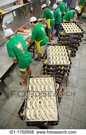 The production line at the Fu Mei Hsiun croissant bakery. View Large Photo Image Stock Photo - The production line at the Fu Mei Hsiun croissant bakery.. Fotosearch