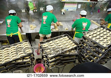 The production line at the Fu Mei Hsiun croissant bakery. View Large Photo Image Stock Photo - The production line at the Fu Mei Hsiun croissant bakery.. Fotosearch