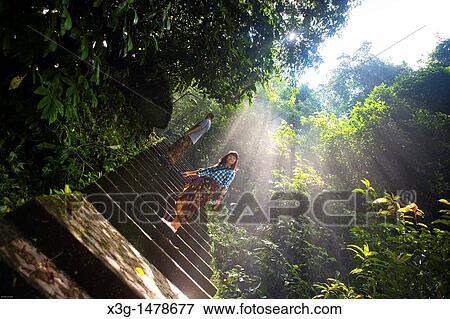Stock Photo - The Pura Batu Karu is one of the largest temples in Bali. It is located a ways out from Denpasar and offers locals a quiet and secluded place of worship. Fotosearch