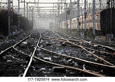 The railway track merging, Set of Points on a Railway Train Track, Pune, Maharashtra, India View Large Photo Image Picture - The railway track merging, Set of Points on a Railway Train Track, Pune, Maharashtra, India. Fotosearch