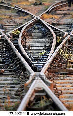 Stock Photograph - The railway track merging, Set of Points on a Railway Train Track, Pune, Maharashtra, India. Fotosearch