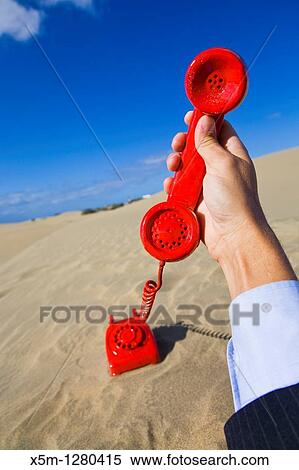 Stock Photography - The Red Phone Must Be Answered. Fotosearch