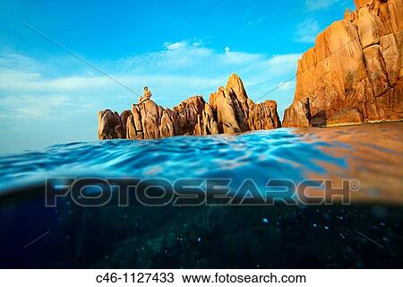 The Red Rock. Rocce Rosse. Arbatax. Ogliastra Province. Sardinia. Italy. View Large Photo Image Stock Image - The Red Rock. Rocce Rosse. Arbatax. Ogliastra Province. Sardinia. Italy.. Fotosearch