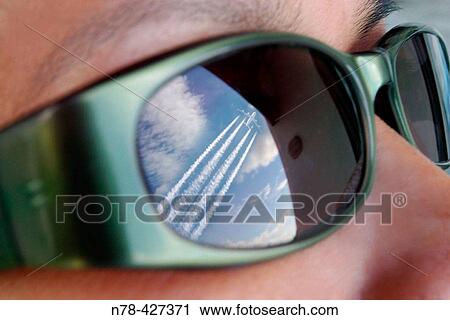 The reflection of a jet on sunglasses. Begur. Girona. Costa Brava. Catalunya. Spain. View Large Photo Image Stock Image - The reflection of a jet on sunglasses. Begur. Girona. Costa Brava. Catalunya. Spain.. Fotosearch