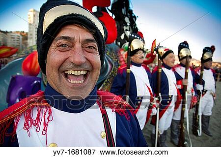 Stock Photo - The revolutionary troops at the burial of Boqueron, which puts an end to the carnival Malaga, Andalusia, Spain, Europe. Fotosearch