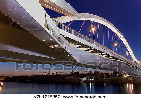 The river Guadalquivir Bridge of La Barqueta Seville, Andalusia, Spain View Large Photo Image Stock Image - The river Guadalquivir Bridge of La Barqueta Seville, Andalusia, Spain. Fotosearch