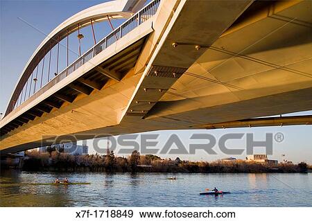 The river Guadalquivir Bridge of La Barqueta Seville, Andalusia, Spain View Large Photo Image Stock Photo - The river Guadalquivir Bridge of La Barqueta Seville, Andalusia, Spain. Fotosearch