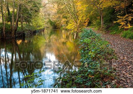The River Teign flowing through Dunsford Wood in autumn in the Dartmoor National Park, Devon, England, UK, Europe View Large Photo Image Stock Image - The River Teign flowing through Dunsford Wood in autumn in the Dartmoor National Park, Devon, England, UK, Europe. Fotosearch