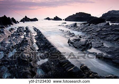 The rock formations by the sea at Hartland Quay. View Large Photo Image Stock Image - The rock formations by the sea at Hartland Quay.. Fotosearch