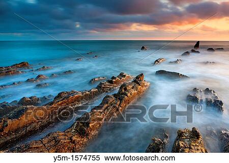 The rocky shores of Hartland Quay in North Devon, England, United Kingdom, Europe View Large Photo Image Stock Photography - The rocky shores of Hartland Quay in North Devon, England, United Kingdom, Europe. Fotosearch