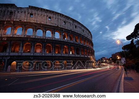 The Roman Colosseum and car light-trails, Rome, Lazio, Italy. View Large Photo Image Stock Photo - The Roman Colosseum and car light-trails, Rome, Lazio, Italy.. Fotosearch