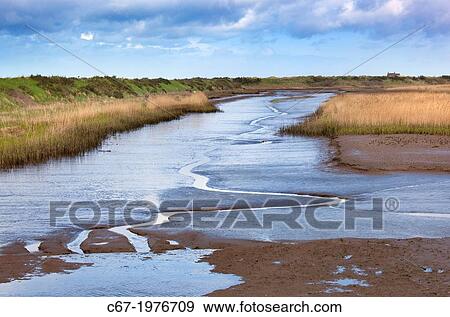 The Rspb Nature reserve at Titchwell Marsh Norfolk. View Large Photo Image Stock Photo - The Rspb Nature reserve at Titchwell Marsh Norfolk.. Fotosearch