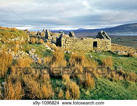 The ruins of the village of Slievemore on Achill Island, County Mayo, Ireland Deserted in the years of the Great famine View Large Photo Image Picture - The ruins of the village of Slievemore on Achill Island, County Mayo, Ireland Deserted in the years of the Great famine. Fotosearch